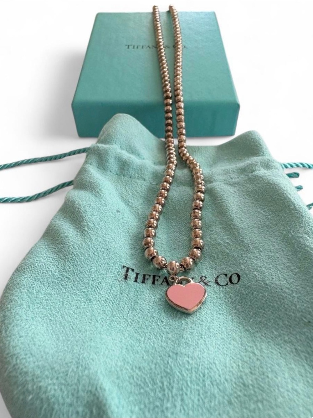 Tiffany & Co. Silver Bead Necklace with Pink Heart Charm